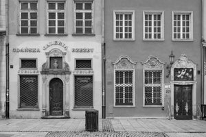 Gdansk architecture with decorative doors upper windows and iron grilles