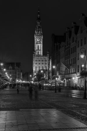 Illuminated Main Town Hall clock tower in Gdansk at night
