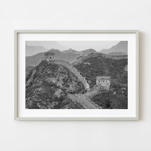 Great Wall of China crossing mountain ridges in black and white