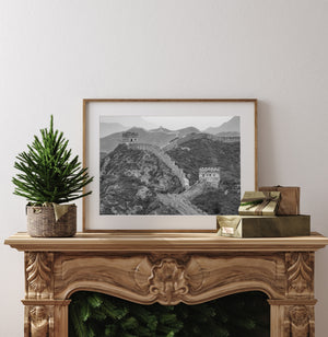 Ancient Chinese wall and watchtowers in a mountain landscape
