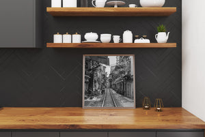 Converging railway tracks through Hanoi Train Street neighborhood