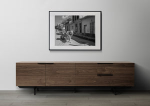 Black and white daily life street scene in Cuba
