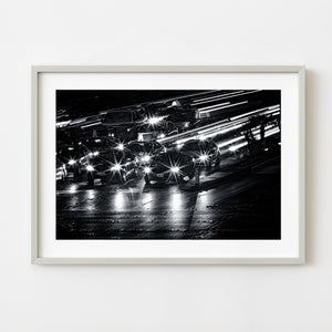 Black and white Las Vegas Strip traffic with starburst headlights