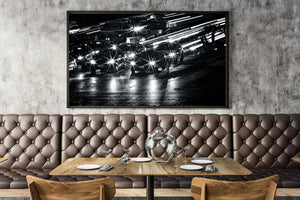 Black and white city traffic with long exposure light trails