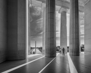 Lincoln Memorial colonnade framing Washington Monument and Reflecting Pool