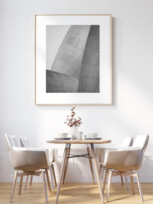 Marble panel seams sweep across the Lotus Temple’s curved petals in a black and white photograph from India.