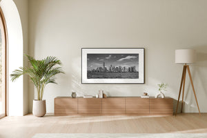 Downtown Manhattan skyline with textured water in foreground
