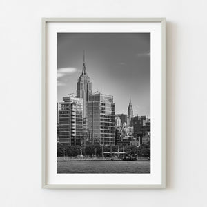 Black and white Manhattan skyline with Empire State and Chrysler Buildings