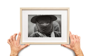 Northern China portrait with eyes framed by heavy fabric