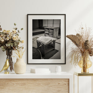 A wooden reading stand supports an open book in the master's private room of a Matsue samurai house.