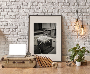 Curved pages contrast with the straight lines of tatami and paper screens in a Japanese interior.