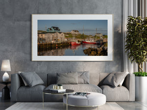 Fishing boats reflected in calm harbor water