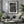 Vertical architectural photograph of windows fire escapes and ladders