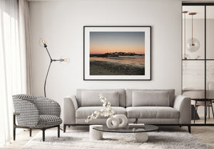 Peaceful seaside village viewed across a Maine beach