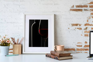 Minimalist red wine still life with black negative space