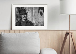 Sighisoara portrait of a man in a hat and heavy jacket