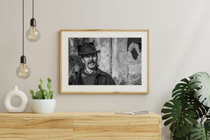 Romanian street portrait framed by textured historic architecture