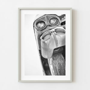 Black and white classic car photographed from directly below