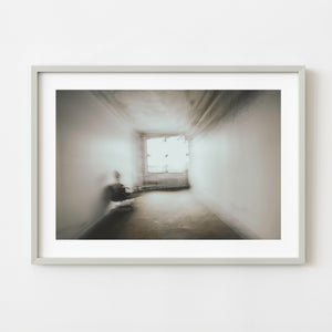 Sepia motion blur interior with chair and bright window