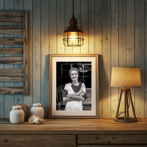 Black and white portrait showing an elderly woman's smile