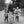 Black and white photograph of Tibetan mother and children walking