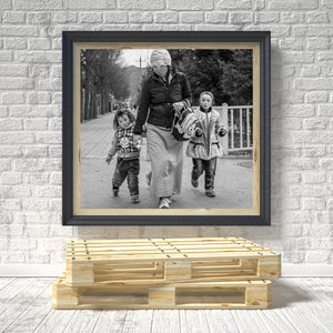 Candid Qinghai street scene with mother and two children