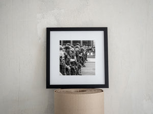 Perspective view along a long line of uniformed police officers