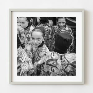 Black and white portrait of face painted girl at Tuscan wine festival