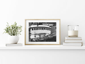 Black and white photograph of a corroded ship bridge