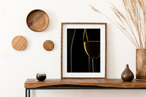 Dark bottle outlined by narrow studio lighting