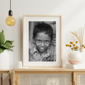 Black and white close-up portrait with direct eye contact