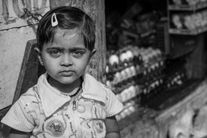 Young Indian girl looking directly at the camera in Coonoor