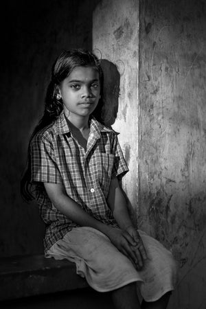 Unposed portrait of a girl near Pollenthai Beach India