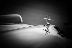 Elegant chrome design of a classic car ornament