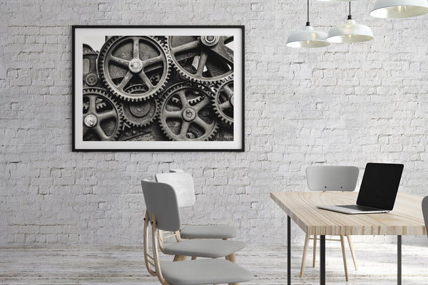 Artistic composition of antique mechanical gears, with emphasis on their geometric patterns and the historical innovation in engineering.