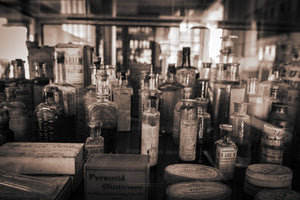 Vintage pharmacy wall art with labelled jars