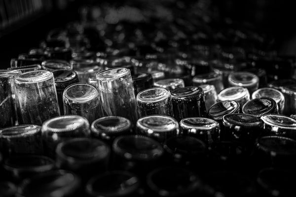 Bottles closeup black and white in a rum factory in Cuba | Photo Art Print fine art photographic print