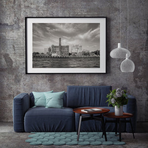 Clouds rise above Brooklyn’s industrial waterfront and old brick sugar refinery.