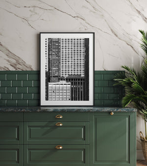 Chicago architecture photograph with bright window grids beside darker vertical facade patterns.