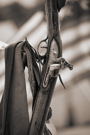 Closeup of 18th century musket with American flag background | Photo Art Print fine art photographic print