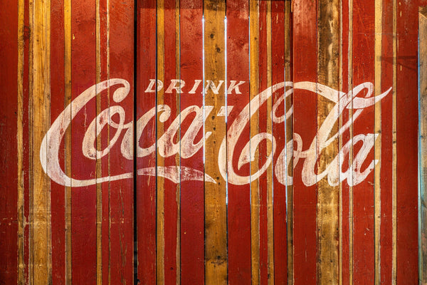 Coca Cola painted on a wood plank wall | Photo Art Print fine art photographic print