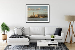 Coastal Havana photograph of Morro Castle and lighthouse across calm harbour water.