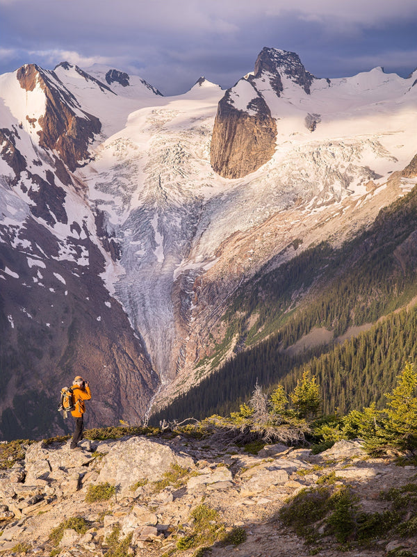 Hiker photographing the receding glaciers in the Rocky Mountains | Photo Art Print fine art photographic print
