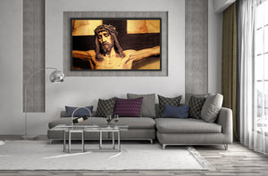 Carved figure of Jesus against a dark wooden cross