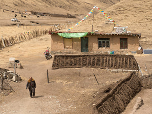 Man walking on driveway in Northern China | Photo Art Print fine art photographic print