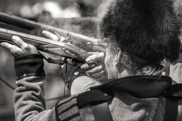 Militia soldier firing closeup during the war of 1812 reenactment | Photo Art Print fine art photographic print
