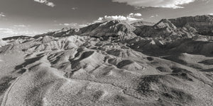 Black and white aerial view of eroded ridges in the Nevada desert