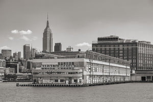 Pier 57 waterfront terminal beneath the Manhattan skyline