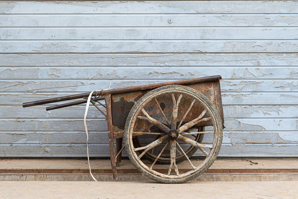 Old homemade metal wheel barrel against a wall in Beijing China | Photo Art Print fine art photographic print