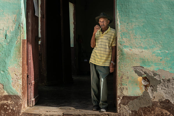 Older man standing at the doorway Trinidad Cuba | Photo Art Print fine art photographic print